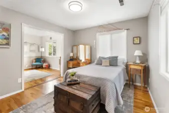 Bedroom 1 on upper level, with bonus room to the left