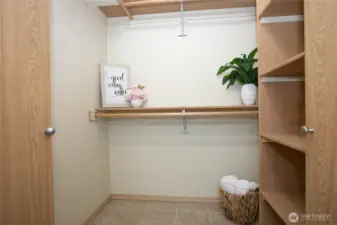 Spacious walk-in closet with plenty of storage