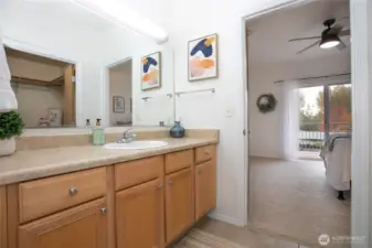 Bonus sink and vanity across from the walk-in closet