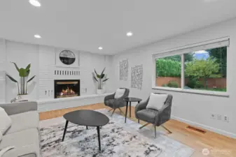 Bright Family Room with Brick Fireplace