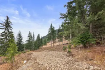 This double lot sits at the very top of a quiet cul-de-sac—Hyak’s highest elevation point.