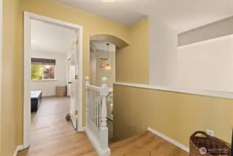 Upstairs, hardwood floors continue to the second level