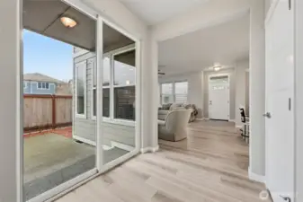 Sliding glass door leads to the semi-covered porch.