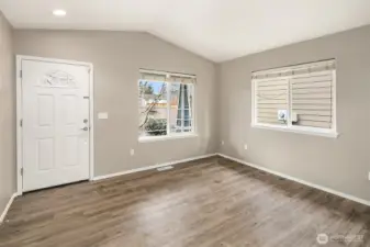 Entry and formal living room unstaged