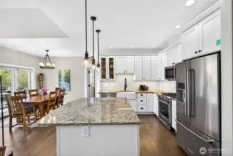 Open and bright kitchen flowing into the living area