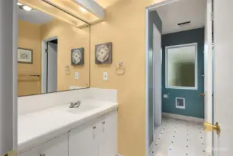 This bathroom is shared by both of the main floor bedrooms.