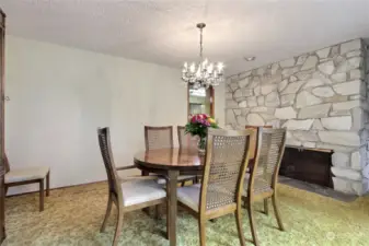 Formal living room off kitchen and living room. The sliding glass door (not shown) leads to a large deck.