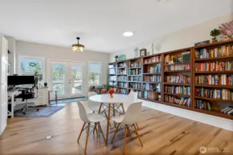 Tremendous library space, comprised of six matching bookshelves, adds substantial value to this home. Prefer the wall for furniture (or maybe a Murphy Bed)? Just ask and the sellers will consider professionally removing them.