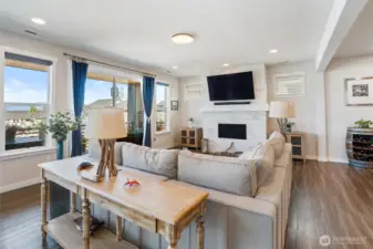 Watch t.v. or the sun set behind the Olympics? Both!