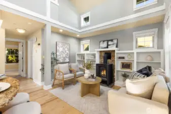 Cozy living room, complete with fireplace and built-in shelves