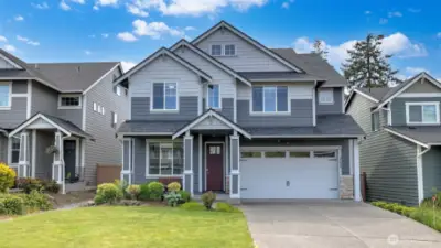 Welcome home to Saratoga! Offering a spacious layout on a quiet cul de sac, this home is perfect for growing households or multi-generational living. The kitchen features granite countertops, stainless steel appliances, large walk-in pantry & plenty of cabinetry, opening to light-filled living areas ideal for entertaining. A cozy gas fireplace in the great room really helps to enhance the warmth & move-in ready appeal. The primary suite includes a spa-like ensuite bath w/large soaker tub & generous walk-in closet. Step outside to enjoy a fully fenced backyard w/a covered patio, great for year round enjoyment. Located near Kent Station, parks, trails, & major commuter routes, this home offers comfort, convenience, & exceptional value.