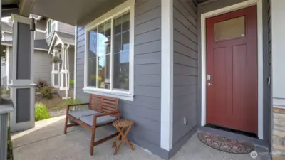 Welcoming front porch with space for seating—perfect for relaxing with a morning coffee or evening breeze