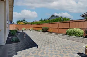Another view of the back patio area.  Back yard has it's own sprinkler system for easy care living.