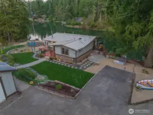 This is an opportunity to own a wonderful waterfront home and a second buildable lot across the street for whatever your heart desires