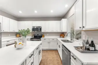 Quartz countertops and SS appliances