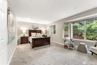 Private primary suite on its own floor with extra seating space