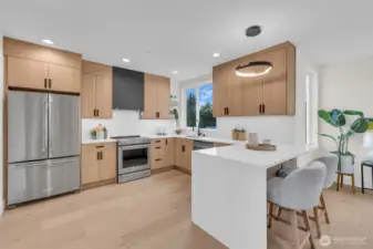 This multiple cooks, multi visitors design makes this kitchen the heart and soul of this home.