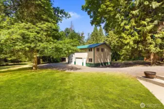 Welcome to your 1,000 square foot shop! Plenty of space here with an xtra large slot for your bigger toys. Additional parking available on both sides of the structure