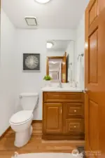 Main floor guest .5 bath near the entrance of the home