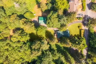 Large lot offers a bit of open space, sunlight, shade, trees and privacy