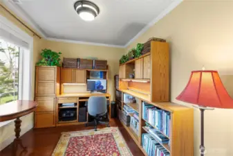 French doors open to the main floor den/office/bonus room.