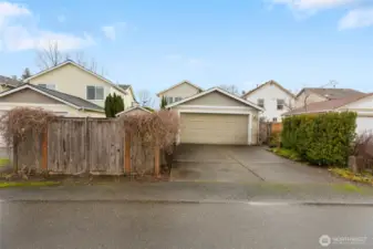 Two car garage and additional driving parking.
