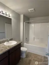 U2 - Primary Bathroom. Granite countertop