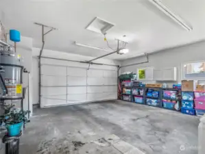 Garage that holds two cars and so much more!