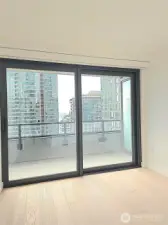 Sliders in both bedroom and livingroom!