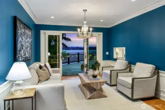 This room could be used as dining or living as shown here. The flow to the deck and Wisteria is perfection