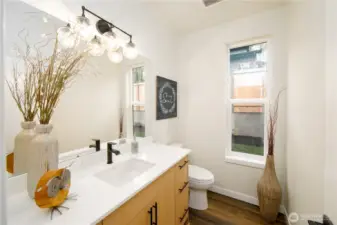 This photo is from another home by the same builder and reflects similar finishes and style.