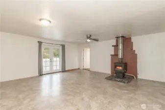 Frestanding wood fireplace heats entire home.