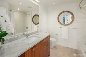 Second bath adjacent to guest bedroom.