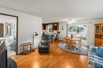 Great angle that shows the hallway to the separate bedroom wing - far from the party area.