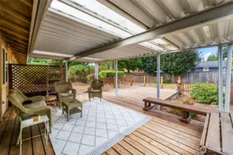 Large covered and uncovered decks are perfect for relaxing or entertaining (some boards need replacing).