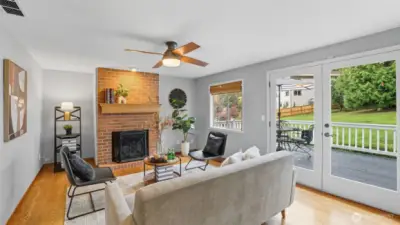Enjoy evenings by the fire or open the French doors to extend your living outdoors.