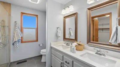 A serene primary ensuite designed for both function and relaxation.