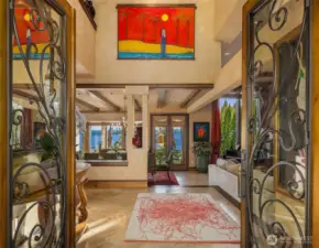A dramatic two story entry beckons you in.