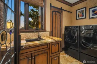 Even the laundry room is elegantly appointed and has a view.
