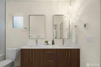 Luxurious primary bathroom boasting a double vanity and sleek contemporary finishes.