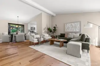 The open concept in this part of the home offers a smooth transition from the living room to dining room.