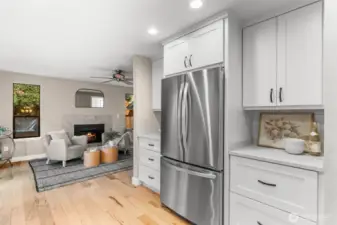 A bright kitchen with updated appliances invites effortless cooking and entertaining.