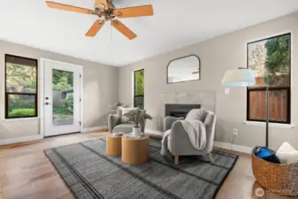 A ceiling fan and direct backyard access create a quiet, and comfortable retreat.