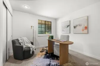 Bedroom featuring ample closet space and fitted carpet flooring, providing comfort and storage convenience.