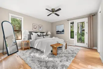 Private backyard access directly from the primary bedroom, offering seamless indoor-outdoor living and a tranquil retreat.