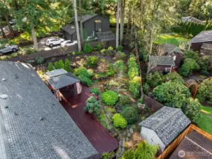 An overhead shot highlights the spacious backyard.