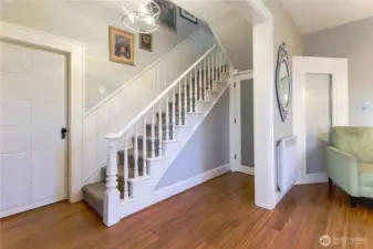 Short term rental possibility with window blinds, door, and sound panels on bedroom door.