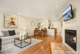 Looking back from the living area to the kitchen you can see the open feeling of the main floor living/dining and kitchen area.