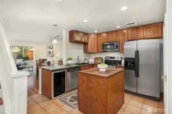 The kitchen has a pantry (out of view) and is accessed through the laundry room from your private 1 car attached garage.