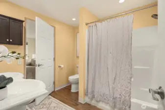 View of the upper level bathroom full tub/shower